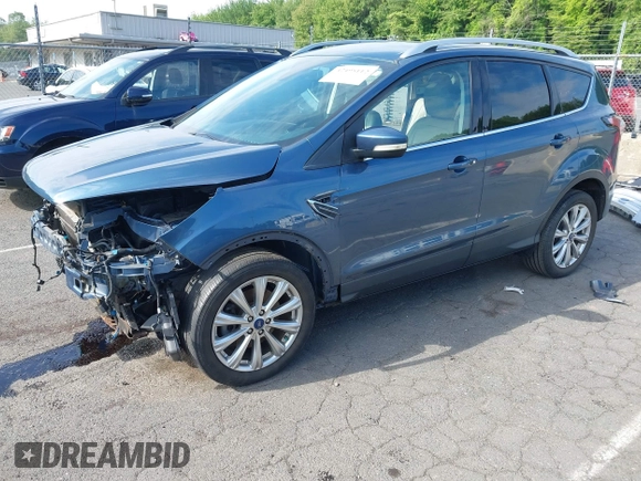 2018 Ford Escape Titanium with VIN 1FMCU9J92JUB01162, listed as a IAAI auction lot 42495112 with 96,280 mi miles and . Bid and sale history available at DreamBid. Image 20.