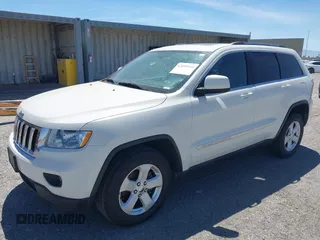 2012 Jeep Grand Cherokee Laredo with VIN 1C4RJEAG0CC210274, listed as a IAAI auction lot 42099944 with 177,527 mi miles. Bid and sale history available at carsss.com. Image 2.