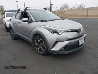 2018 Toyota C-HR XLE with VIN JTNKHMBX5J1011568, listed as a IAAI auction lot 42043867 with 30,699 mi miles. Bid and sale history available at carsss.com. Image 1.
