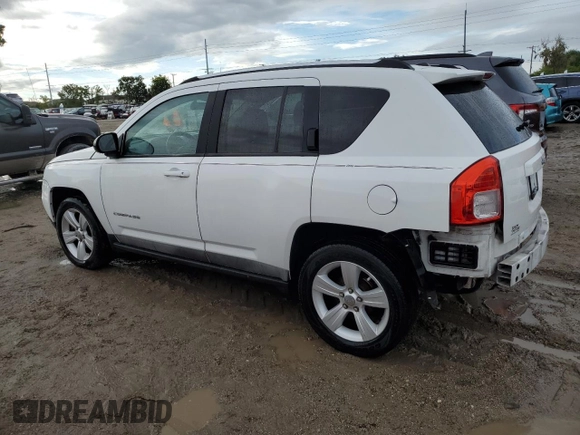 2011 Jeep Compass with VIN 1J4NT1FB8BD138161, listed as a Copart auction lot 73679894 with 199,735 mi miles and Salvage Title. Bid and sale history available at carsss.com. Image 2.