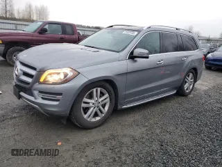 2015 Mercedes-Benz GL-Class GL 450 with VIN 4JGDF6EE3FA520036, listed as a Copart auction lot 51633165 with 105,019 mi miles and Salvage Title. Bid and sale history available at carsss.com. Image 1.