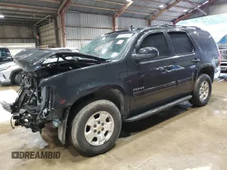 2014 Chevrolet Tahoe LT with VIN 1GNSCBE02ER237636, listed as a Copart auction lot 56195865 with 138,261 mi miles and Salvage title. Bid and sale history available at DreamBid. Image 1.