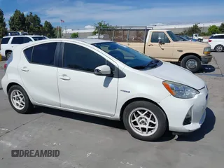 2014 Toyota Prius One z VIN JTDKDTB34E1562216, wystawiony jako IAAI lot #42281999 z przebiegiem 206 867 mil mil oraz . Historia ofert i sprzedaży dostępna na DreamBid. Obrazek 1.