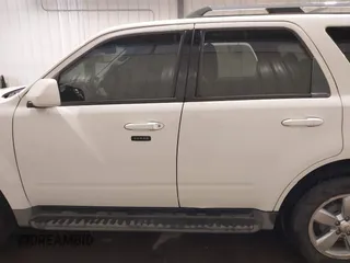 2011 Mercury Mariner Premier with VIN 4M2CN9HG3BKJ02026, listed as a IAAI auction lot 40254703 with 99,000 mi miles and . Bid and sale history available at DreamBid. Image 14.