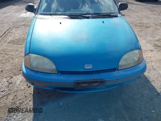 1997 Geo Metro LSi z VIN 2C1MR2299V6736395, wystawiony jako IAAI lot #41987306 z przebiegiem 356 060 mil mil oraz . Historia ofert i sprzedaży dostępna na DreamBid. Obrazek 6.