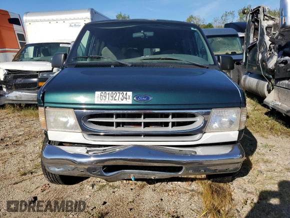 2000 Ford Econoline Passenger XL with VIN 1FMRE11L9YHB19715, listed as a Copart auction lot 69192734 with 237,129 mi miles and Salvage title. Bid and sale history available at DreamBid. Image 5.