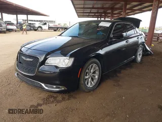 2016 Chrysler 300 Anniversary Edition with VIN 2C3CCAAG4GH141217, listed as a IAAI auction lot 42121809 with 74,739 mi miles and . Bid and sale history available at DreamBid. Image 18.