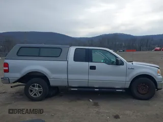 2006 Ford F-150 XL with VIN 1FTPX12V76NB12573, listed as a IAAI auction lot 41354996 with 145,796 mi miles. Bid and sale history available at carsss.com. Image 13.