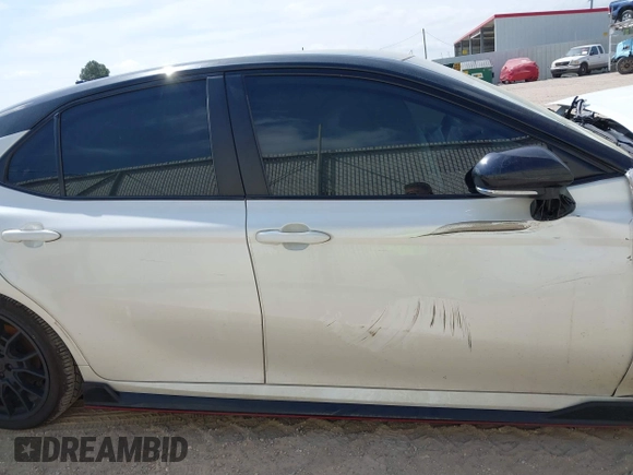 2022 Toyota Camry TRD with VIN 4T1KZ1AK6NU069341, listed as a IAAI auction lot 41881252 with 55,871 mi miles and . Bid and sale history available at DreamBid. Image 14.