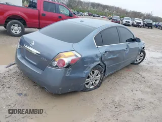 2012 Nissan Altima 2.5 S with VIN 1N4AL2AP3CN404443, listed as a IAAI auction lot 41965031 with 121,613 mi miles. Bid and sale history available at carsss.com. Image 4.
