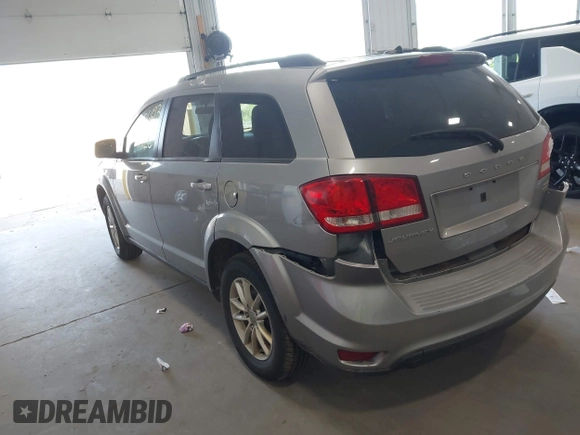 2015 Dodge Journey SXT z VIN 3C4PDCBG1FT587061, wystawiony jako IAAI lot #42186693 z przebiegiem 186 551 mil mil oraz . Historia ofert i sprzedaży dostępna na DreamBid. Obrazek 3.