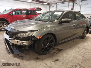 2018 Honda Civic Hatchback Sport with VIN SHHFK7H46JU229577, listed as a IAAI auction lot 41306263 with 76,408 mi miles. Bid and sale history available at carsss.com. Image 18.