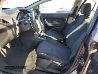 2013 Ford Fiesta SE z VIN 3FADP4BJ9DM186382, wystawiony jako Copart lot #67754934 z przebiegiem 157 495 mil mil oraz Szkoda całkowita • Salvage title. Historia ofert i sprzedaży dostępna na DreamBid. Obrazek 7.