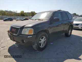 2004 GMC Envoy SLT with VIN 1GKDT13SX42423677, listed as a Copart auction lot 69012884 with Not Provided miles and Clean Title. Bid and sale history available at carsss.com. Image 1.