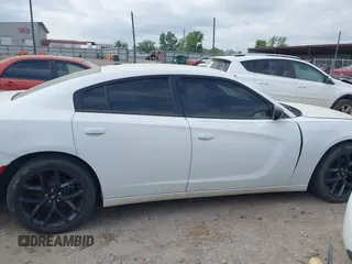 2019 Dodge Charger SXT with VIN 2C3CDXBG6KH670806, listed as a IAAI auction lot 42051415 with 112,144 mi miles and . Bid and sale history available at DreamBid. Image 13.