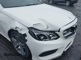 2016 Mercedes-Benz E 400 with VIN WDDHF6HB8GB179547, listed as a IAAI auction lot 41570461 with 147,765 mi miles and . Bid and sale history available at carsss.com. Image 6.