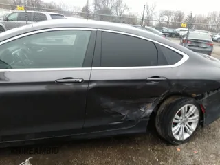 2015 Chrysler 200 Limited with VIN 1C3CCCAB0FN738371, listed as a IAAI auction lot 41208960 with 91,286 mi miles and . Bid and sale history available at DreamBid. Image 14.