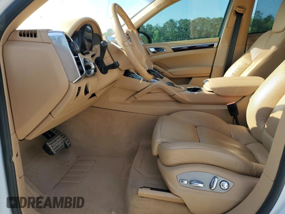 2012 Porsche Cayenne with VIN WP1AA2A2XCLA10081, listed as a Copart auction lot 55394935 with 181,316 mi miles and Salvage title. Bid and sale history available at DreamBid. Image 7.