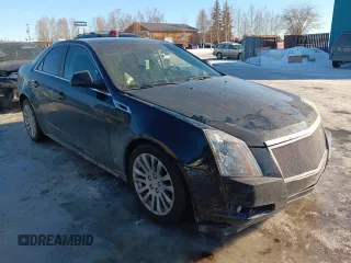 2013 Cadillac CTS Performance with VIN 1G6DK5E33D0111422, listed as a Copart auction lot 50121745 with 129,335 mi miles and Salvage Title. Bid and sale history available at DreamBid. Image 4.
