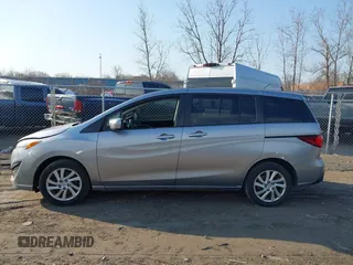2012 Mazda 5 Sport with VIN JM1CW2BL1C0115788, listed as a IAAI auction lot 41770484 with 154,182 mi miles. Bid and sale history available at carsss.com. Image 15.