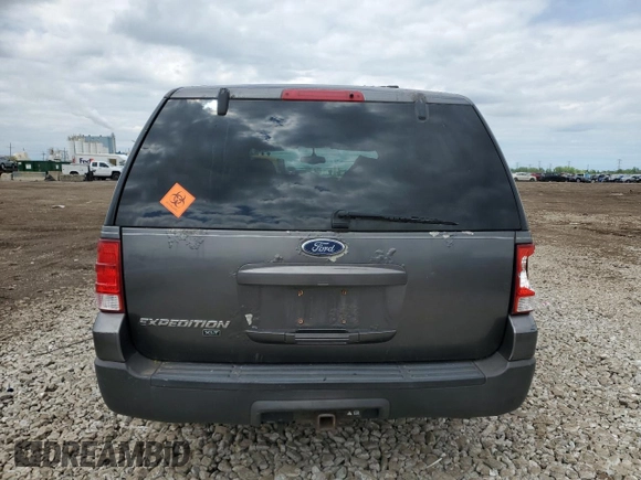 2004 Ford Expedition Special Service with VIN 1FMPU16L74LA55782, listed as a Copart auction lot 58326715 with 68,653 mi miles and Salvage title. Bid and sale history available at DreamBid. Image 6.
