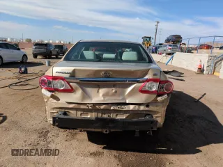 2012 Toyota Corolla L with VIN 5YFBU4EE6CP051067, listed as a Copart auction lot 52988715 with 816,251 mi miles and Salvage Title. Bid and sale history available at DreamBid. Image 6.
