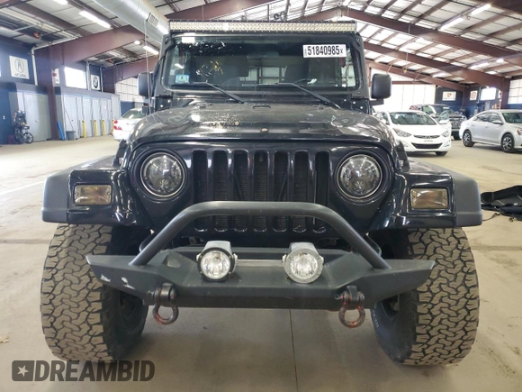 2004 Jeep Wrangler Sport with VIN 1J4FA49S64P722986, listed as a Copart auction lot 51840985 with 129,761 mi miles and Clean title. Bid and sale history available at DreamBid. Image 5.