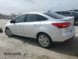 2017 Ford Focus Titanium with VIN 1FADP3J23HL347739, listed as a Copart auction lot 49385365 with 79,484 mi miles and Salvage title. Bid and sale history available at DreamBid. Image 2.