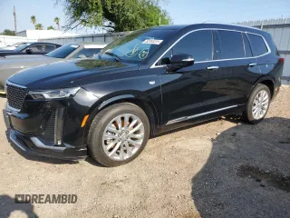 2020 Cadillac XT6 FWD Premium Luxury z VIN 1GYKPCRSXLZ174002, wystawiony jako Copart lot #52083235 z przebiegiem 79 712 mil mil oraz Szkody całkowita. Historia ofert i sprzedaży dostępna na DreamBid. Obrazek 1.