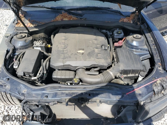 2014 Chevrolet Camaro LS z VIN 2G1FA1E39E9304949, wystawiony jako Copart lot #52332625 z przebiegiem 106 115 mil mil oraz Szkoda całkowita • Salvage title. Historia ofert i sprzedaży dostępna na DreamBid. Obrazek 11.