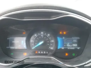 2015 Ford Fusion S Hybrid with VIN 3FA6P0UU4FR111409, listed as a IAAI auction lot 41447316 with 150,068 mi miles. Bid and sale history available at carsss.com. Image 7.