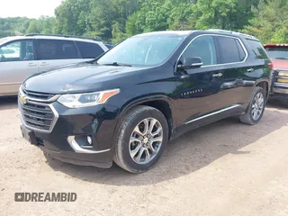 2019 Chevrolet Traverse Premier with VIN 1GNEVKKW1KJ282531, listed as a IAAI auction lot 42408361 with 95,464 mi miles and . Bid and sale history available at DreamBid. Image 2.