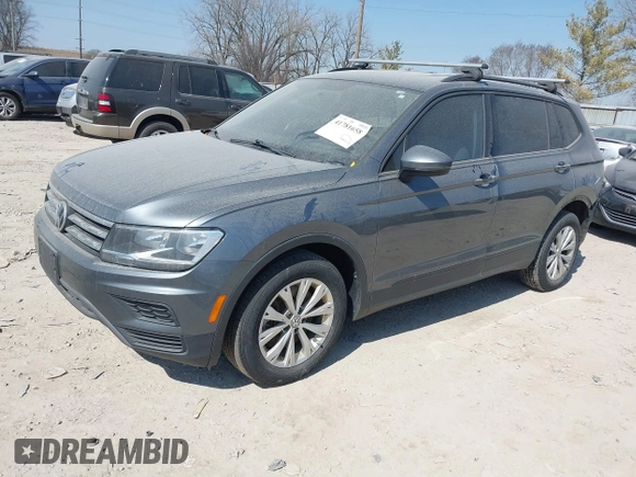 2018 Volkswagen Tiguan S with VIN 3VV0B7AX7JM104662, listed as a IAAI auction lot 41781658 with 235,461 mi miles and . Bid and sale history available at DreamBid. Image 2.