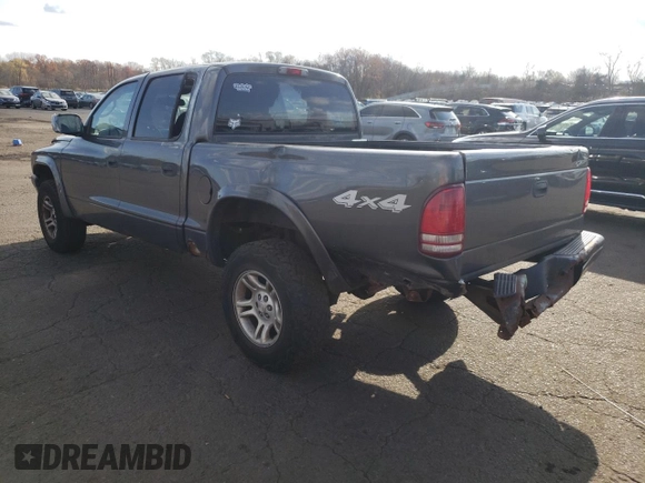 2004 Dodge Dakota Sport z VIN 1D7HG38N64S688604, wystawiony jako Copart lot #79811934 z przebiegiem 160 377 mil mil oraz Szkoda całkowita • Salvage title. Historia ofert i sprzedaży dostępna na DreamBid. Obrazek 2.