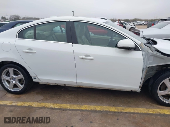 2012 Volvo S60 T5 z VIN YV1622FS3C2127353, wystawiony jako IAAI lot #41440106 z przebiegiem 103 762 mil mil oraz . Historia ofert i sprzedaży dostępna na DreamBid. Obrazek 14.
