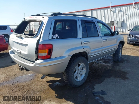2004 Jeep Grand Cherokee Limited z VIN 1J4GW58S84C269863, wystawiony jako IAAI lot #41900325 z przebiegiem 226 587 mil mil oraz . Historia ofert i sprzedaży dostępna na DreamBid. Obrazek 4.