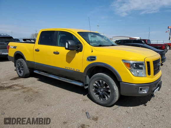 2016 Nissan Titan SL with VIN 1N6BA1F41GN510955, listed as a Copart auction lot 54020155 with 135,551 mi miles and Clean title. Bid and sale history available at DreamBid. Image 4.