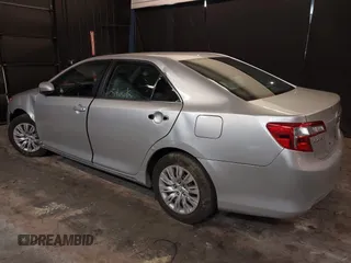 2013 Toyota Camry L with VIN 4T1BF1FK3DU716634, listed as a IAAI auction lot 41759908 with 118,955 mi miles. Bid and sale history available at carsss.com. Image 3.