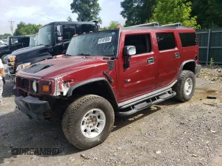 2003 Hummer H2 z VIN 5GRGN23U23H113799, wystawiony jako Copart lot #61101895 z przebiegiem Nie podano mil oraz Czysty tytuł • Clean title. Historia ofert i sprzedaży dostępna na DreamBid. Obrazek 1.