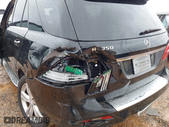 2015 Mercedes-Benz M 350 with VIN 4JGDA5JB4FA544530, listed as a IAAI auction lot 41558572 with 200,973 mi miles and . Bid and sale history available at DreamBid. Image 6.