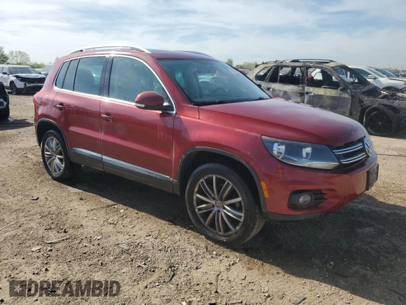 2014 Volkswagen Tiguan SE with VIN WVGAV3AX9EW038118, listed as a Copart auction lot 56329625 with 134,620 mi miles and Salvage title. Bid and sale history available at DreamBid. Image 4.