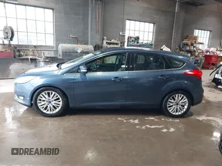 2018 Ford Focus Titanium with VIN 1FADP3N29JL242428, listed as a IAAI auction lot 42323967 with 200,662 mi miles and . Bid and sale history available at DreamBid. Image 14.