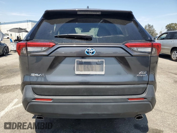 2020 Toyota RAV4 Hybrid XLE with VIN JTMRWRFV7LD063381, listed as a Copart auction lot 60661275 with 70,544 mi miles and Salvage title. Bid and sale history available at DreamBid. Image 6.