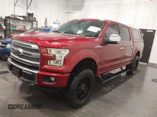 2015 Ford F-150 XLT with VIN 1FTEW1EG5FFB90898, listed as a IAAI auction lot 41617424 with 128,587 mi miles. Bid and sale history available at carsss.com. Image 2.
