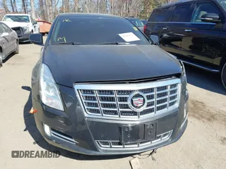 2013 Cadillac XTS Luxury z VIN 2G61R5S33D9184878, wystawiony jako IAAI lot #41644213 z przebiegiem 113 293 mil mil oraz . Historia ofert i sprzedaży dostępna na DreamBid. Obrazek 12.