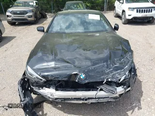 2019 BMW 8 Series M850i xDrive with VIN WBABC4C59KBU96788, listed as a IAAI auction lot 42286659 with 26,913 mi miles and . Bid and sale history available at DreamBid. Image 6.