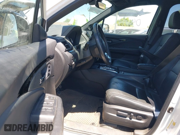 2019 Honda Passport Elite z VIN 5FNYF8H05KB009575, wystawiony jako IAAI lot #42804678 z przebiegiem 70 468 mil mil oraz . Historia ofert i sprzedaży dostępna na DreamBid. Obrazek 5.