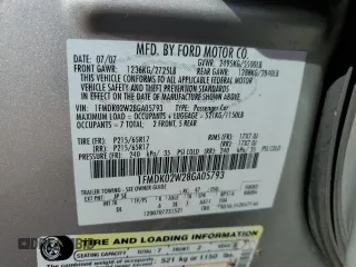 2008 Ford Taurus X SEL with VIN 1FMDK02W28GA05793, listed as a Copart auction lot 52317125 with 158,271 mi miles and Salvage title. Bid and sale history available at DreamBid. Image 13.