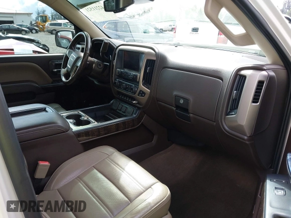 2014 GMC Sierra 1500 Denali z VIN 3GTU2WEJXEG527496, wystawiony jako IAAI lot #42211521 z przebiegiem 151 974 mil mil oraz . Historia ofert i sprzedaży dostępna na DreamBid. Obrazek 5.