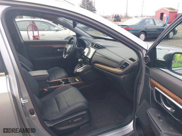 2021 Honda CR-V Touring with VIN 2HKRW2H9XMH212692, listed as a IAAI auction lot 41016640 with 24,149 mi miles. Bid and sale history available at carsss.com. Image 5.